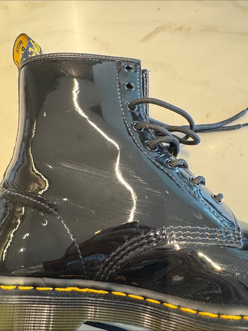 Dr. Martens Black Patent 8-Eye Lace-Up Boots with Yellow Stitching - Picture 7 of 11